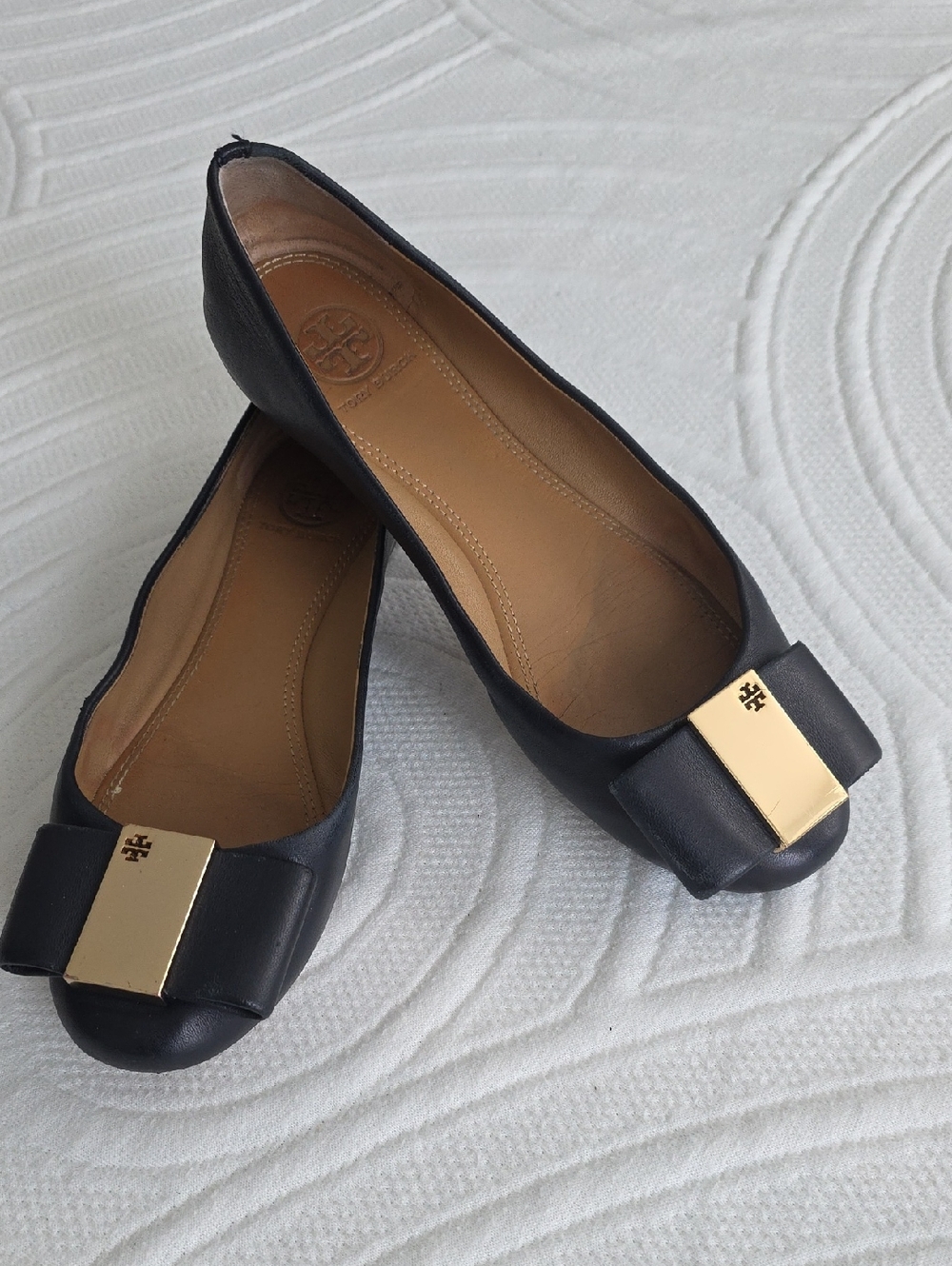 Tory Burch Black Leather Bow Flats with Gold Plaque